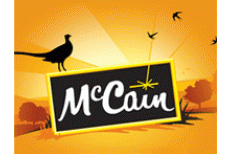 McCain logo with birds and sunrise background
