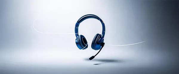 Blue headphones with a white gradient background