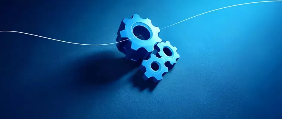 Blue cog wheels with a blue gradient background