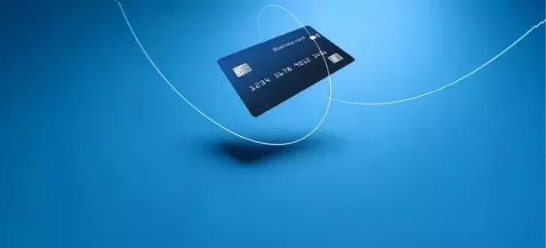 Blue credit card with a blue gradient background